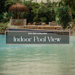 Indoor Pool View der Medi Therme Bochum mit tropischer Wellnesslandschaft und exklusivem Day-Bed Bereich